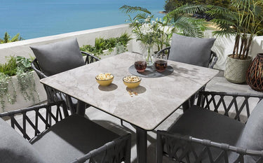 Quatropi 4-Seater Outdoor Dining Set | Grey Ceramic Table And Chairs