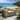 Quatropi Ex-Display Pair of Luxury Rattan Garden Armchairs – Green Cushions