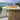 Quatropi Rhonda Outdoor Garden Round Rattan Dining Table Glass Stone 105cm