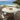 Quatropi Rhonda Outdoor Garden Round Rattan Dining Table Glass Stone 105cm