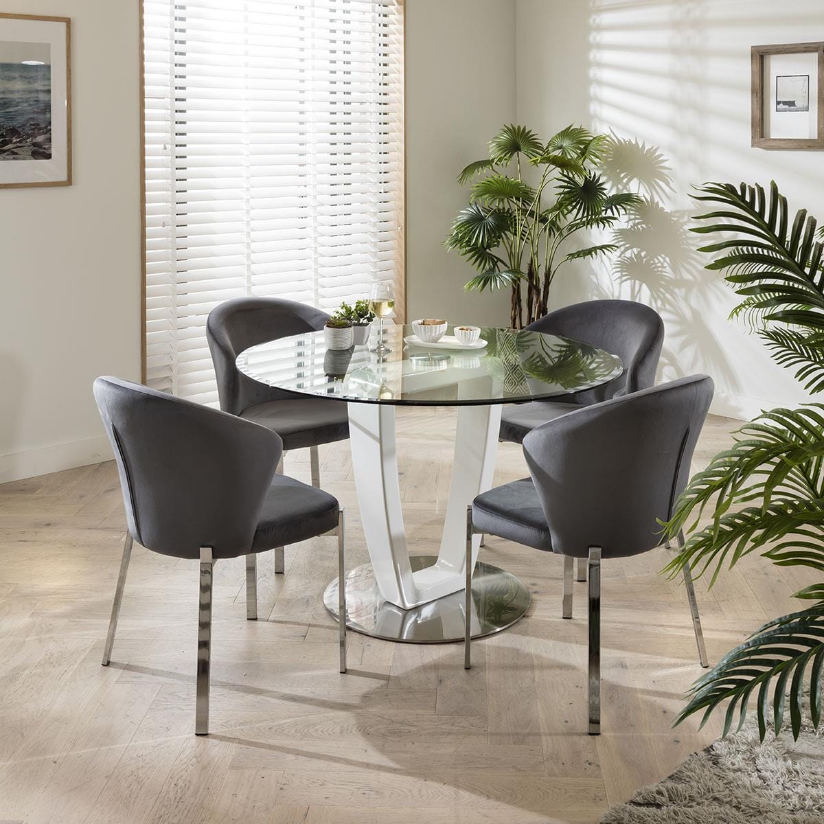 Quatropi 4 Seater Round Glass Dining Set With Pedistal Base & Grey Velvet Chairs