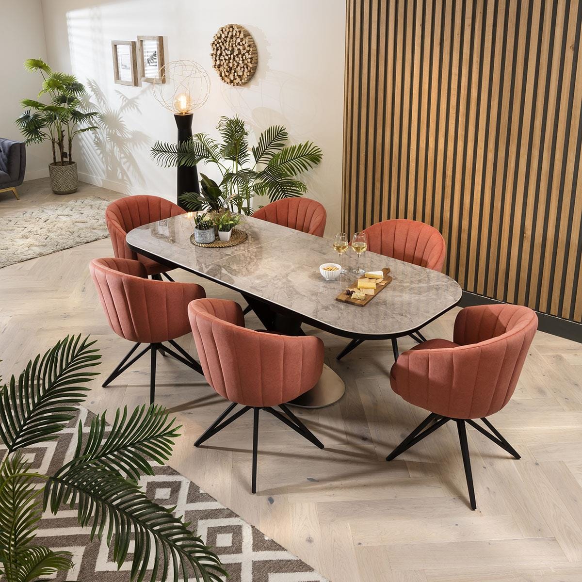 Quatropi 6 Seater Grey Ceramic Extending Table 7 Comfortable Pink Swivel Chairs