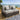 Quatropi ExDisplay Luxury Outdoor Garden 2 Seater Armless Sofa Black Rattan / Grey