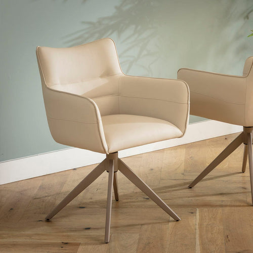 Ruby Carver Style Faux Leather Swivel Dining Chair with Arms Beige